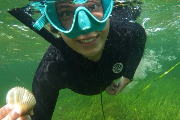 a person swimming in a body of water